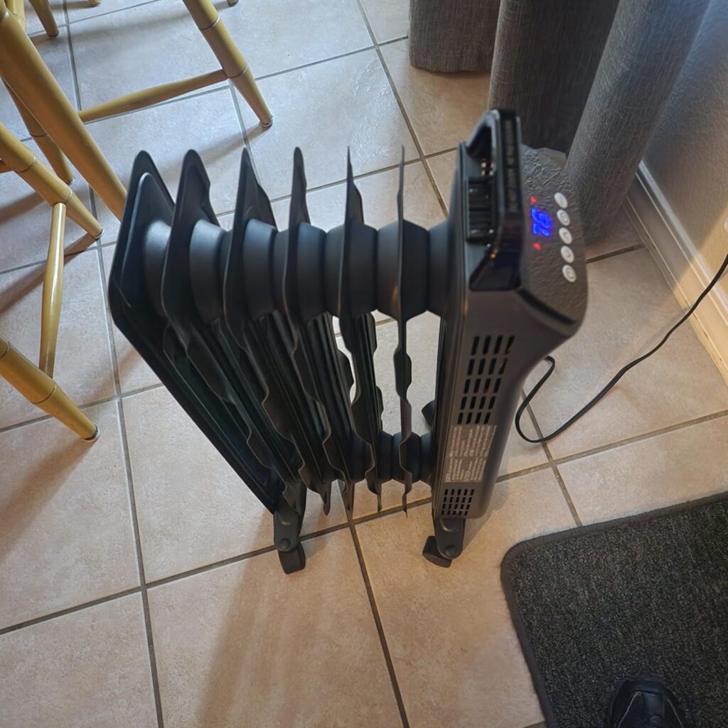 Amazon Basics oil filled radiator heater review — side view of the digital model on casters