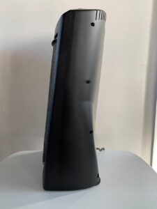 Side view of a Black+Decker infrared quartz tower heater showing its slim profile