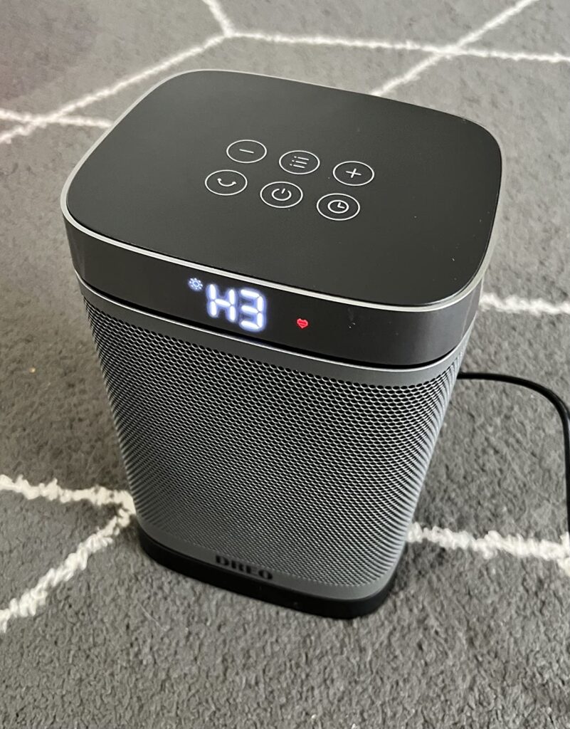 Top view of Dreo DR-HSH004-G space heater showing H3 heat level and touch buttons