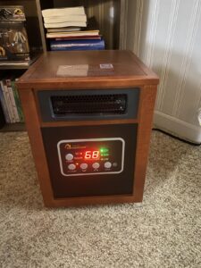 DR-968 review image showing the DR. Infrared Heater running in Eco mode indoors