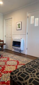 Mr. Heater F299731 30,000 BTU vent-free blue flame natural gas heater installed in living room